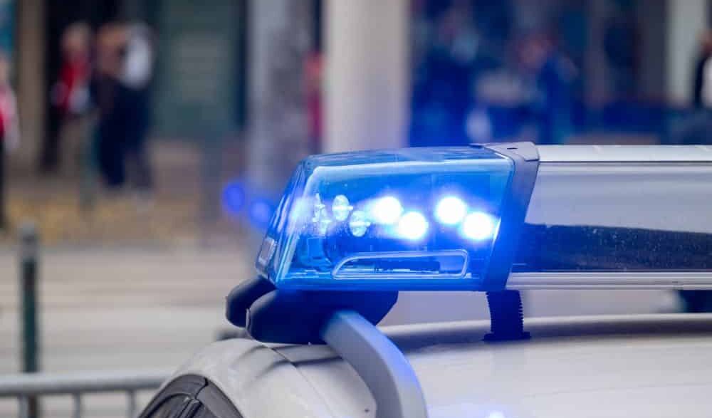 Blue police emergency lights on car